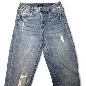 Fashion Nova High Waisted distressed blue jeans